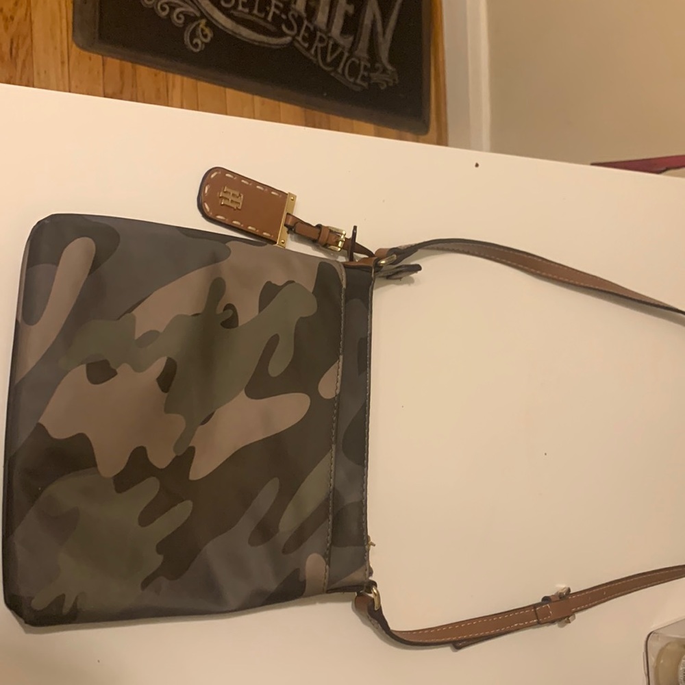 Tommy Hilfiger camouflage cross body purse .